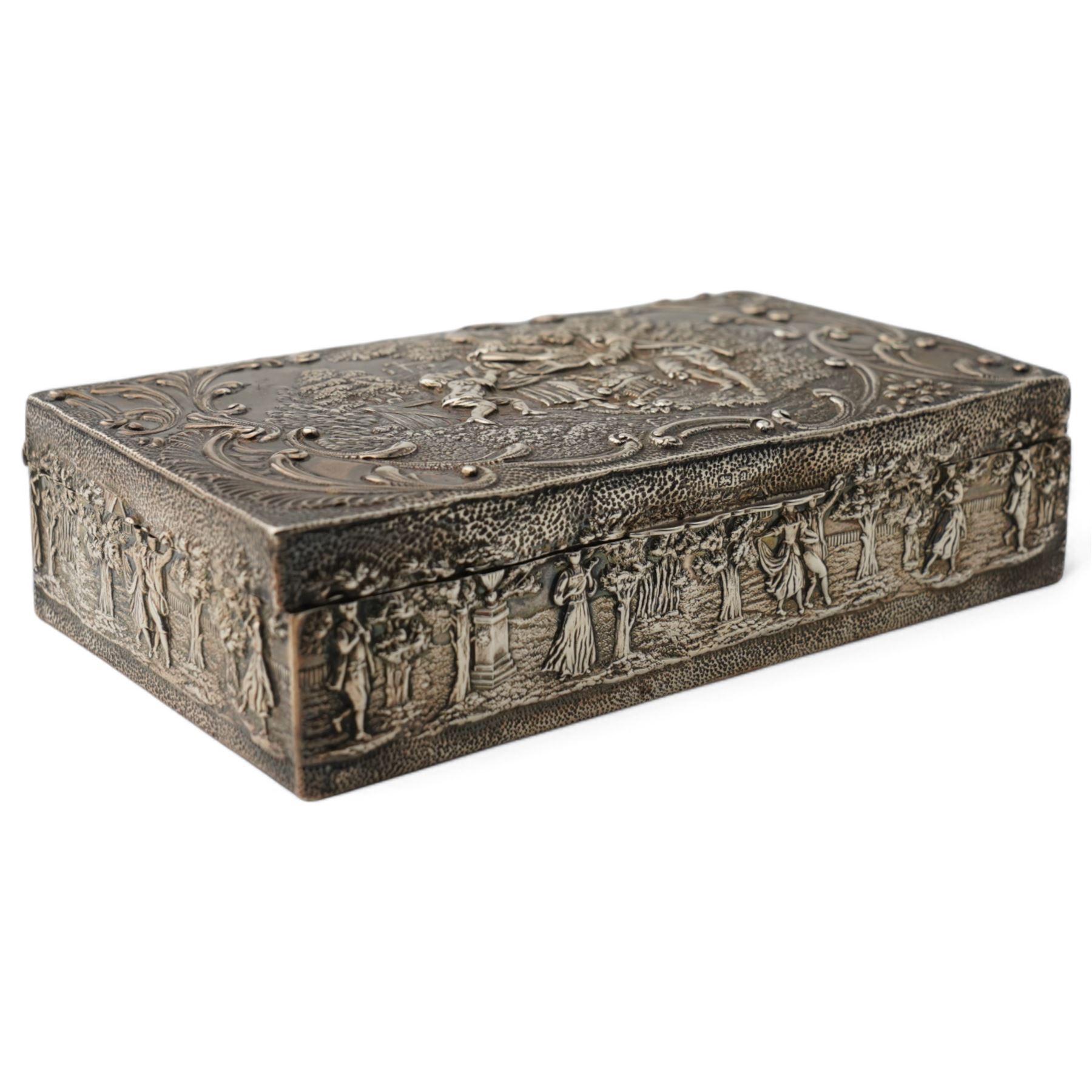 Late Victorian silver rectangular ring box embossed with classical figures, musicians, scrolls etc, and with plush lined divided interior L14.5cm Birmingham 1900 Maker Levi & Salaman