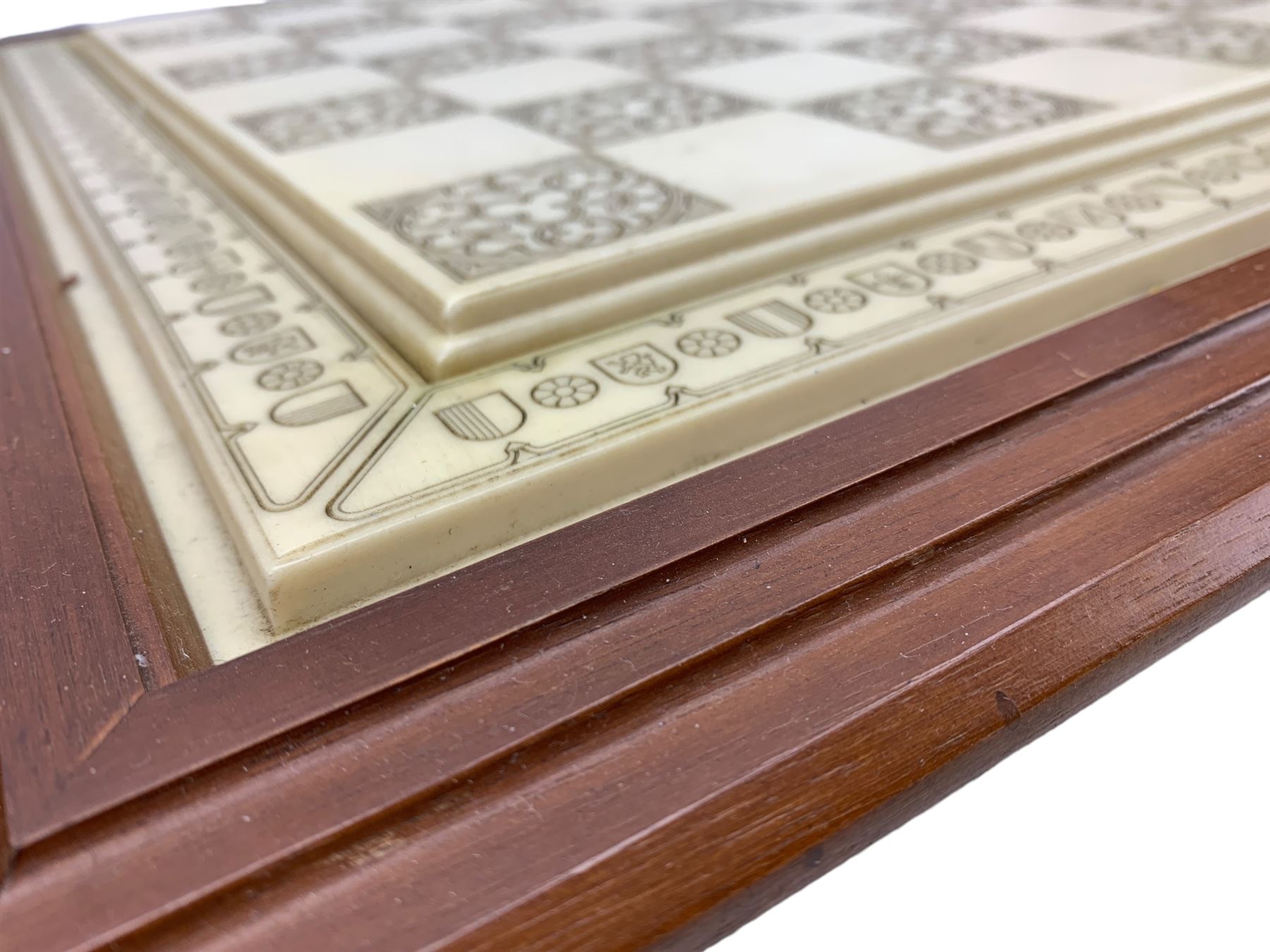 Franklin Mint 'The Great Crusaders' 1989 chess set, with cabinet and ivory resin chess board, 56cm x 56cm, incomplete 