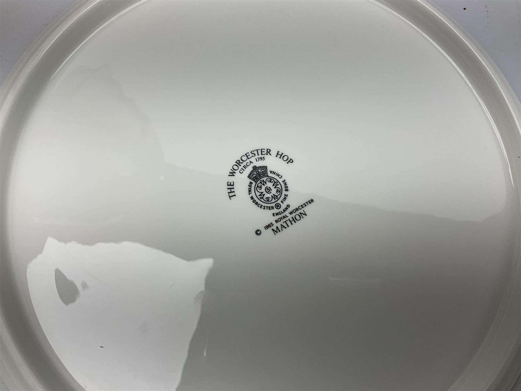 Royal Doulton tea and dinner wares decorated in the Vanity Fair pattern, to include twelve dinner plates, twelve side plates, eleven bowls, three lidded tureens, ten teacups, sauceboat on stand etc, together with boxed Royal Worcester plate, six Royal Worcester ramekins etc