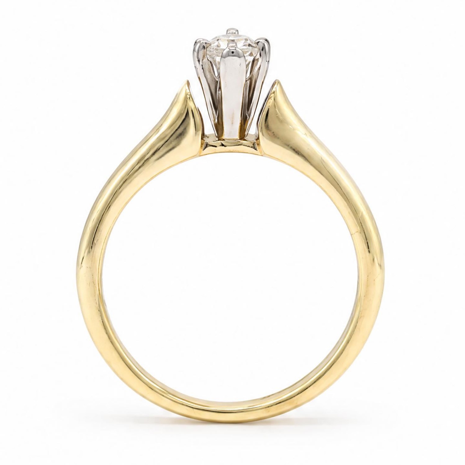14ct gold diamond ring, claw set with a single pear cut diamond of 0.31 carat, stamped 14K, with IGI report