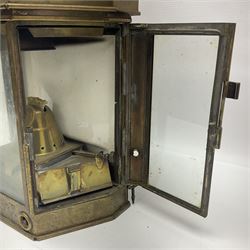 Large brass maritime lamp by Griffiths & Sons Birmingham with swing handle, threaded mounting bracket and associated oil burner, H41cm excluding handle