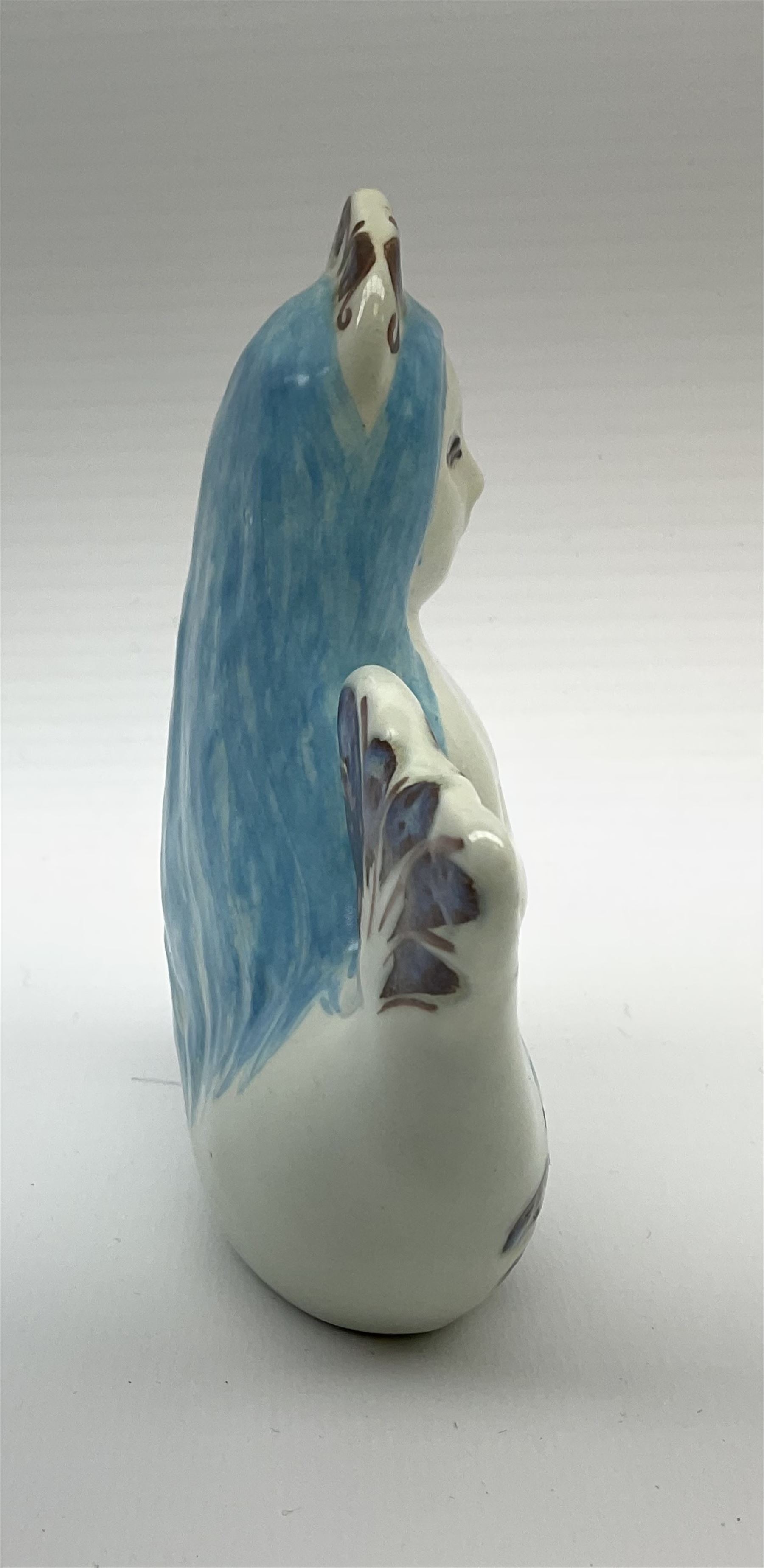 A Doreen Middelboe for Royal Copenhagen Aluminia figure, modelled as a mermaid, with printed and painted marks beneath, H10.5cm.