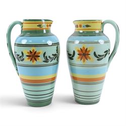 Hartrox Stoneware, comprising five jugs and two bowls, all with green, blue, yellow and oragne floral and abrstact decoration, with printed marks beneath, tallest H26cm