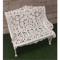  White finish Coalbrookdale style cast iron garden bench, cresting rail with mask above leaf moulded back, scroll decorated seat, W93cm  