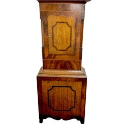 Late 19th century- 8-day mahogany and oak longcase clock, with a swan necked pediment and break-arch hood door beneath flanked by ring turned pilasters, broad trunk with canted corners and a short trunk door with crossbanding and a bone escutcheon, conforming plinth with a shaped base, painted dial with floral spandrels and a country scene to the arch, with Roman numerals, seconds dial and date aperture, dial pinned directly to a rack striking movement, striking the hours on a bell. With weights and pendulum.