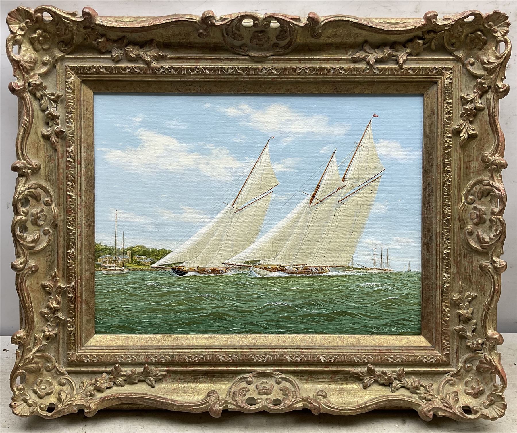 Richard M Firth (British 1971-): 'Westwood and Britannia Racing off the Royal Yacht Squadron - Cowes', oil on canvas laid on to board signed, titled on gallery label verso 29cm x 39cm 
Provenance: with James Starkey, Beverley, label verso