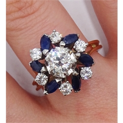 18ct gold diamond and sapphire ring, the central old cut diamond of approx 0.75 carat, with round brilliant cut diamonds and marquise cut sapphires