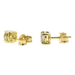 Pair of 18ct gold diamond stud earrings, stamped 750, total diamond weight 0.85 carat, with WGI certificate