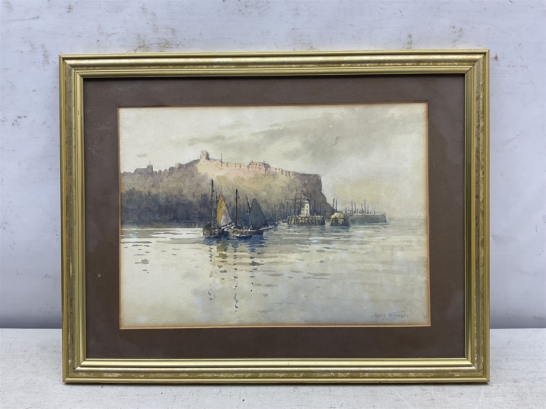 Joseph Eaman (British 1853-1907): View to Scarborough with Grand Hotel, watercolour signed 28cm x 47cm; Harry Wanless (British c1872-1934): Scarborough Castle and Harbour, watercolour signed 23cm x 32cm (2)