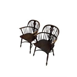 Pair late 20th century oak Windsor elbow chairs, double hoop and stick back with pierced and fretwork work splat, dished seat on turned supports joined by crinoline stretcher