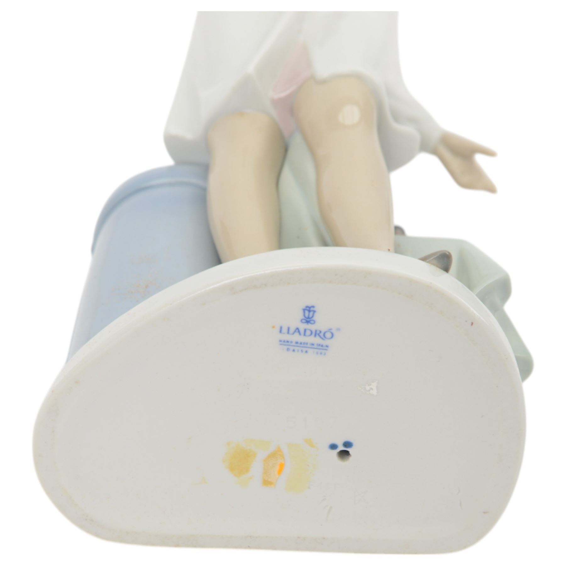 Four Lladro figures, comprising Loving Care no 6087, Young Nurse no 6307, Girl with Chicken no 4592 and Female Physician no 5197, three with original boxes 