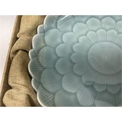 Two Chinese Celadon glazed bowls, one of lotus flower shape and the other with floral decoration to the centre, both with underglaze seal marks, D22cm, together with cylindrical vase and dish
