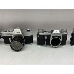 Collection of camera bodies and lenses, to include Contax 159mm, Pentacon FM, Miranda EE, Canon EXee, Praktica IV FB, 'Photax-Paragon 1:5 f=300mm no.312703' lens, 'Sirius MC Automatic 1:2.8 f=28mm, 52 No.934417 etc