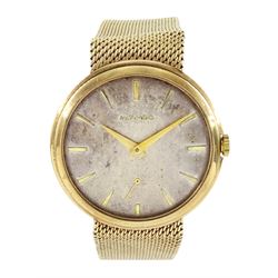 Movado gentleman's 9ct gold manual wind wristwatch, silvered dial with baton hour markers and subsidiary seconds dial, London 1958, on integral 9ct gold bracelet