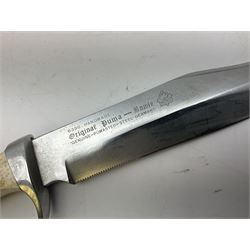 German Original Puma-Bowie knife, with maker's name and number 6396 to the 16.5cm blade, stamped number 73373 to the guard, antler grip, in original hard plastic case with brown leather sheath, also marked Puma