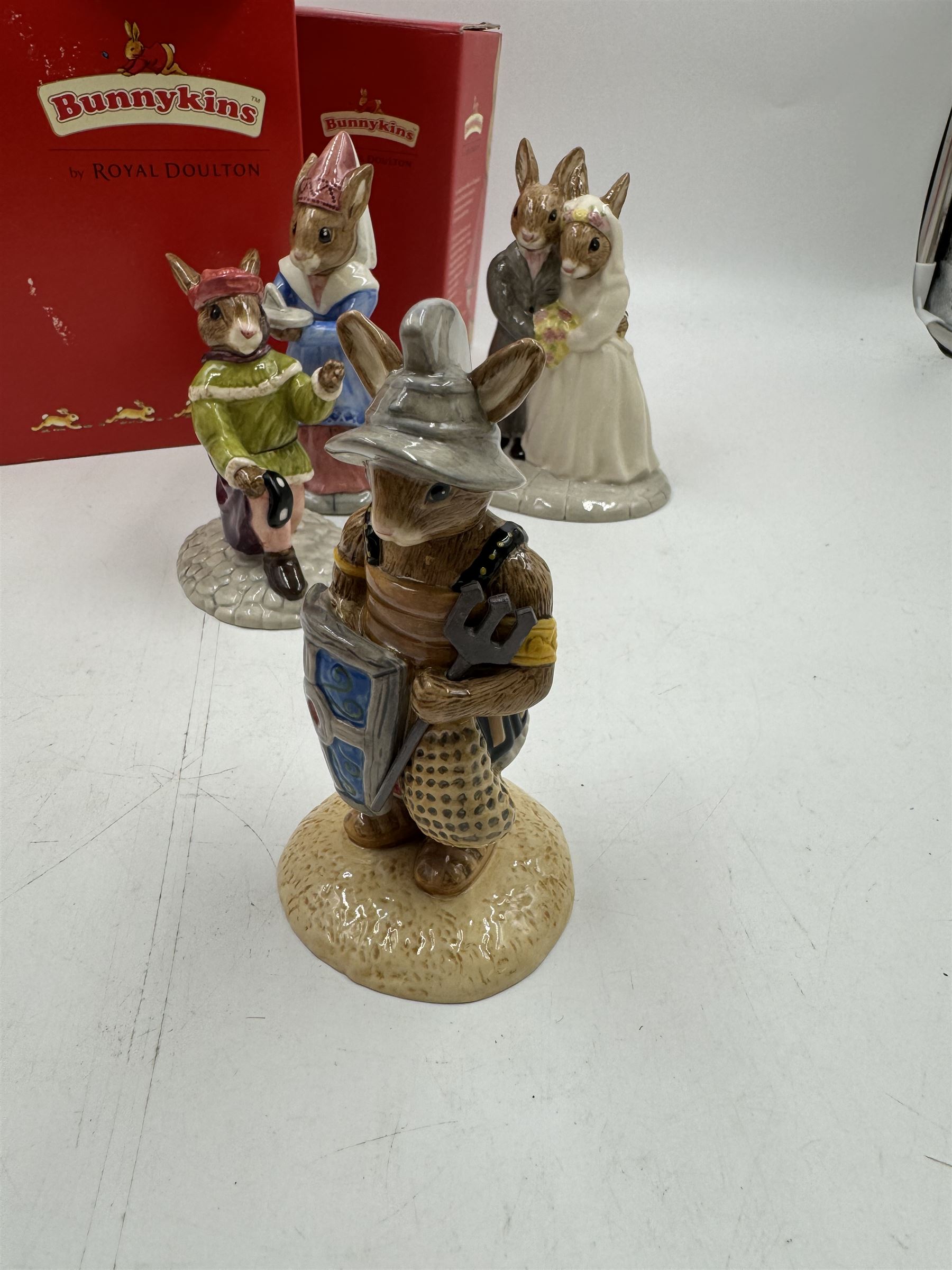 Five Royal Doulton Bunnykins comprising Sundial, Wedding Day, Gladiator, Romeo and Juliet 