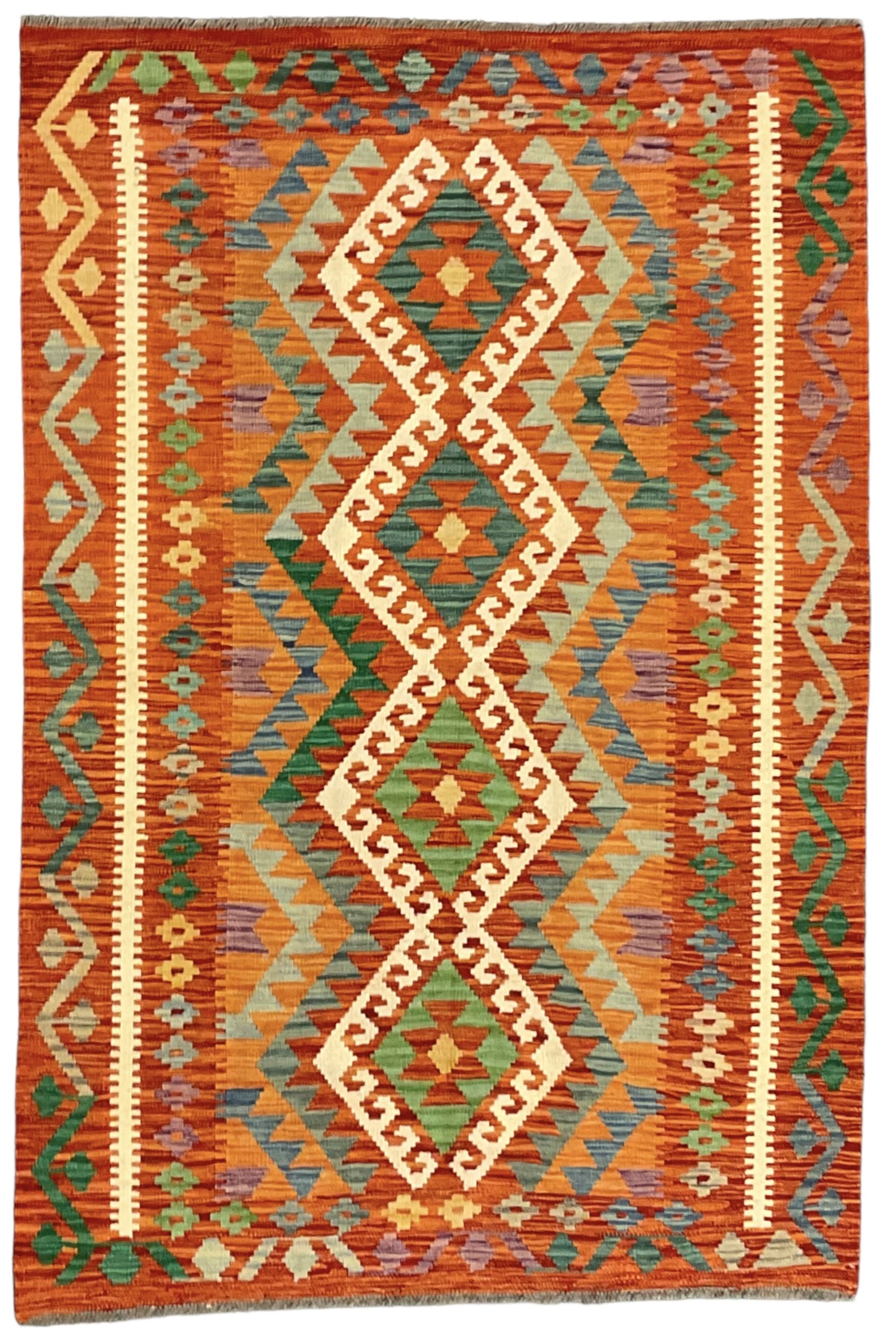 Anatolian Turkish Kilim amber ground rug, the field decorated with four lozenges with ivory outline, the double banded orange border with repeating geometric patterns 