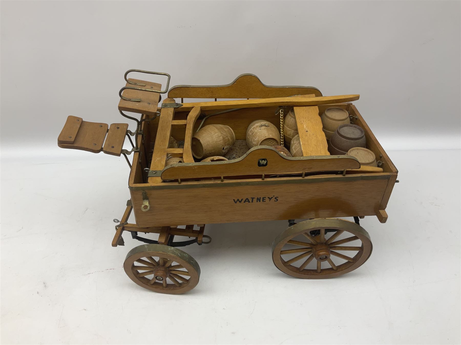 Approximately forty seven ceramic Shire horses to include Sylvac and Melba Ware examples of various sizes and colours, many with harnesses, and a quantity of carts and wagons 