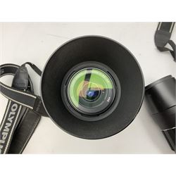 Three Olympus Camera bodies, comprising of OM-D E-M5, E-400 and E-450,   together with 'Samyang Mirror Lens 800mm 1:8.0DX', Olympus 'Zuiko Digital 40-150mm 1;3.5-4.5mm' lens, three other lenses and Velbon CX444 tripod 