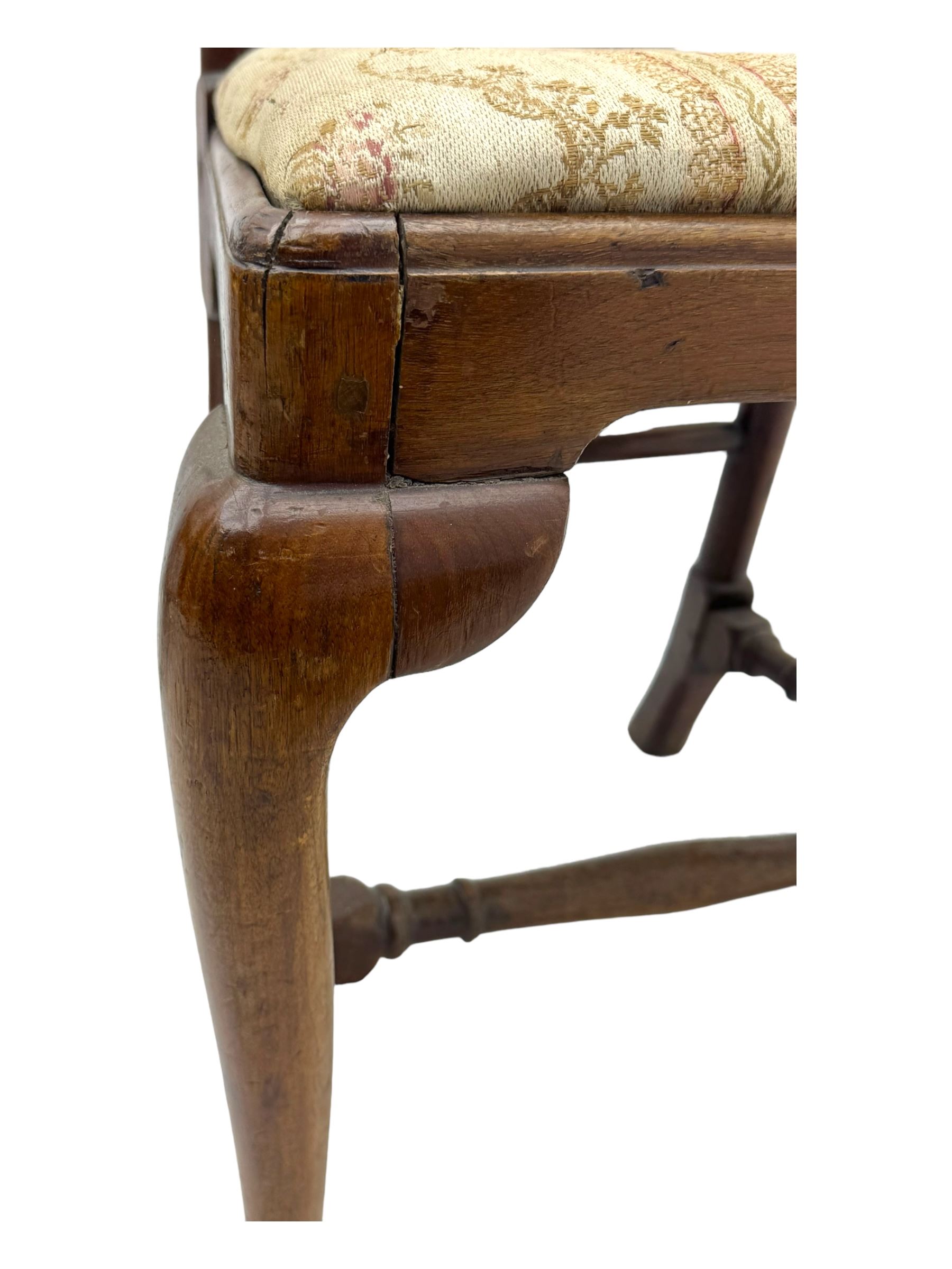 Pair of 19th century Queen Anne design walnut framed side chairs, yoke crest rail over vase-shaped splat, upholstered drop-in seats, raised on cabriole supports with pad feet united by turned stretchers