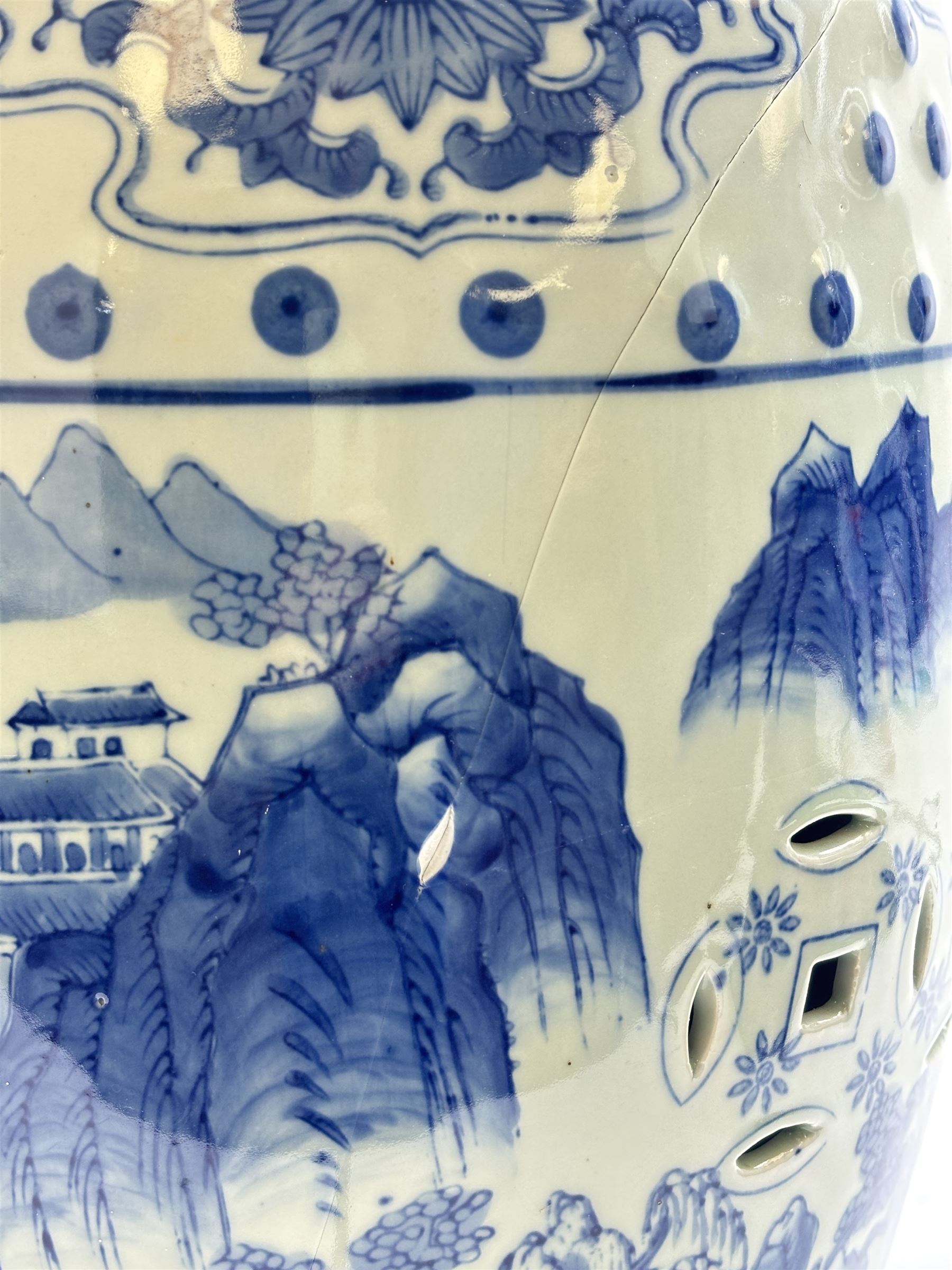 Pair of Chinese blue and white garden stools, decorated with pagodas a landscape, H40cm 