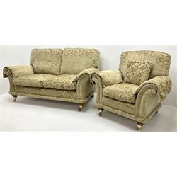 David Gundry upholstery of pale gold embossed fabric - two seat sofa, scrolling arms, tapering supports on castors (W180cm) and matching armchair (W100cm)
