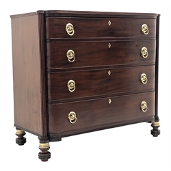  Regency mahogany bow front chest, moulded top with ebonised stringing, four long cockbeaded drawers with brass ring handles, flanked by reeded columns, ring turned supports with beaded collars, W`116cm, D56.5cm, H105cm  