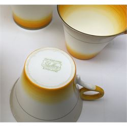 A Shelley Art Deco tea service, decorated in pattern no W12405, with bands of grey, orange and yellow, comprising teapot, open sucrier, milk jug, cake plate, six teacups, six saucers, six side plates, and six dessert plates. 