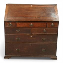 George III oak bureau, the fall front enclosing a fitted interior of small drawers and pigeonholes, above seven graduated drawers with brass plate handles and bone escutcheons, raised on bracket feet