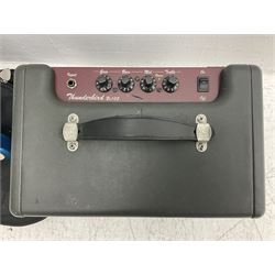 Richwood electric bass guitar in blue, cream and natural finish L117cm; in Fender soft carrying case; together with Behringer Thunderbird Bx108 amplifier date code 0 4 11.