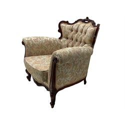 French carved walnut finish framed armchair, button back upholstery
