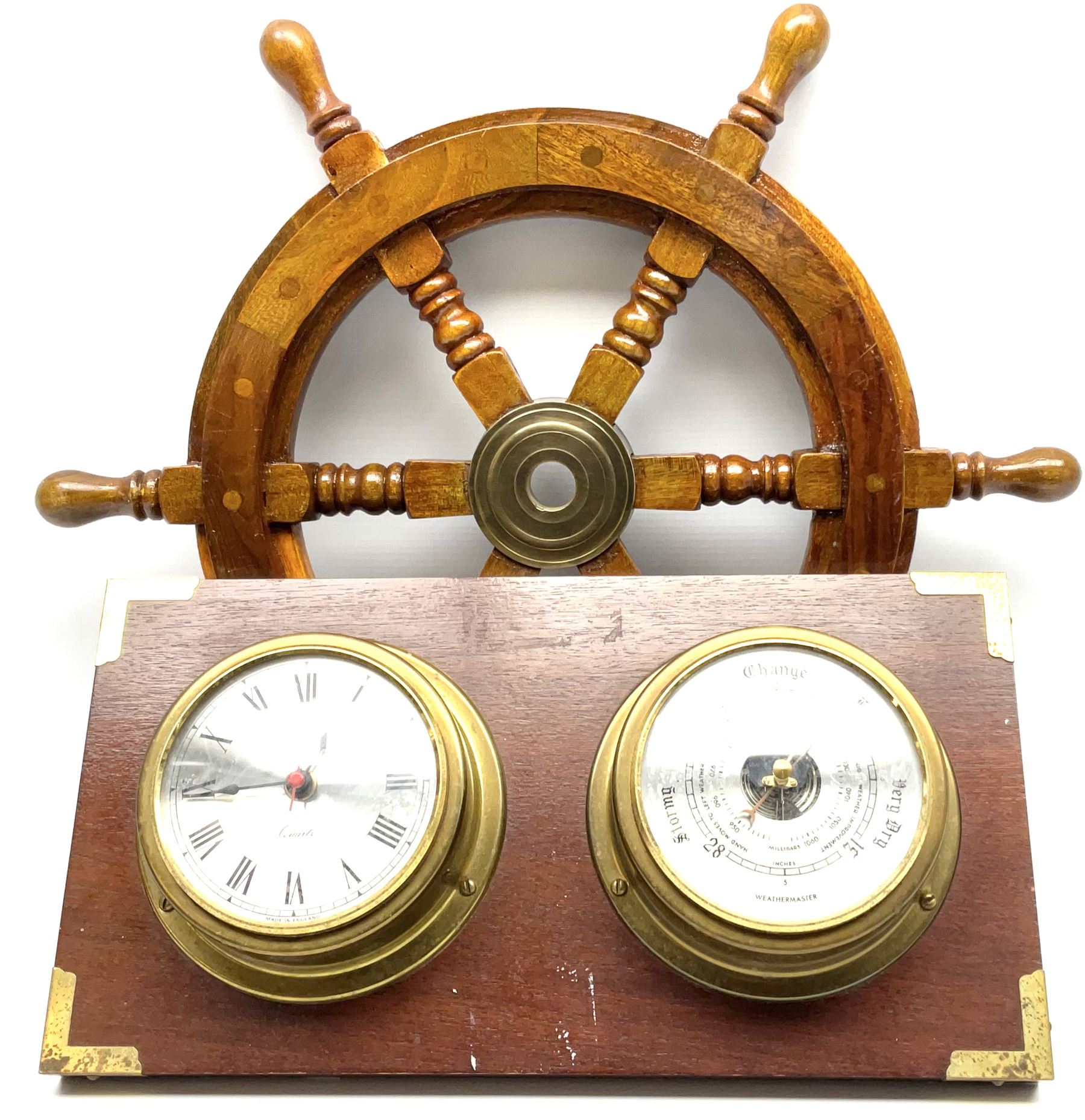 Wall hanging Spectrum quartz clock and Weathermaster barometer, together with six turned spokes ship wheel with brass central boss, D48cm