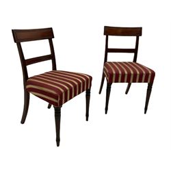 Set five 19th century mahogany dining chairs, moulded rectangular cresting rails over matching middle rails, reed carved upright supports, seats upholstered in striped fabric, on turned front supports, four side chairs and one carver 
