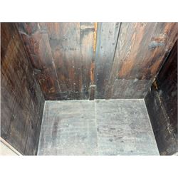 Victorian figured walnut single wardrobe, the moulded cornice with a central diamond motif over a pair of arched panelled doors with striking book-matched veneers, enclosing a fitted interior with hanging rail and hooks, on a plinth base