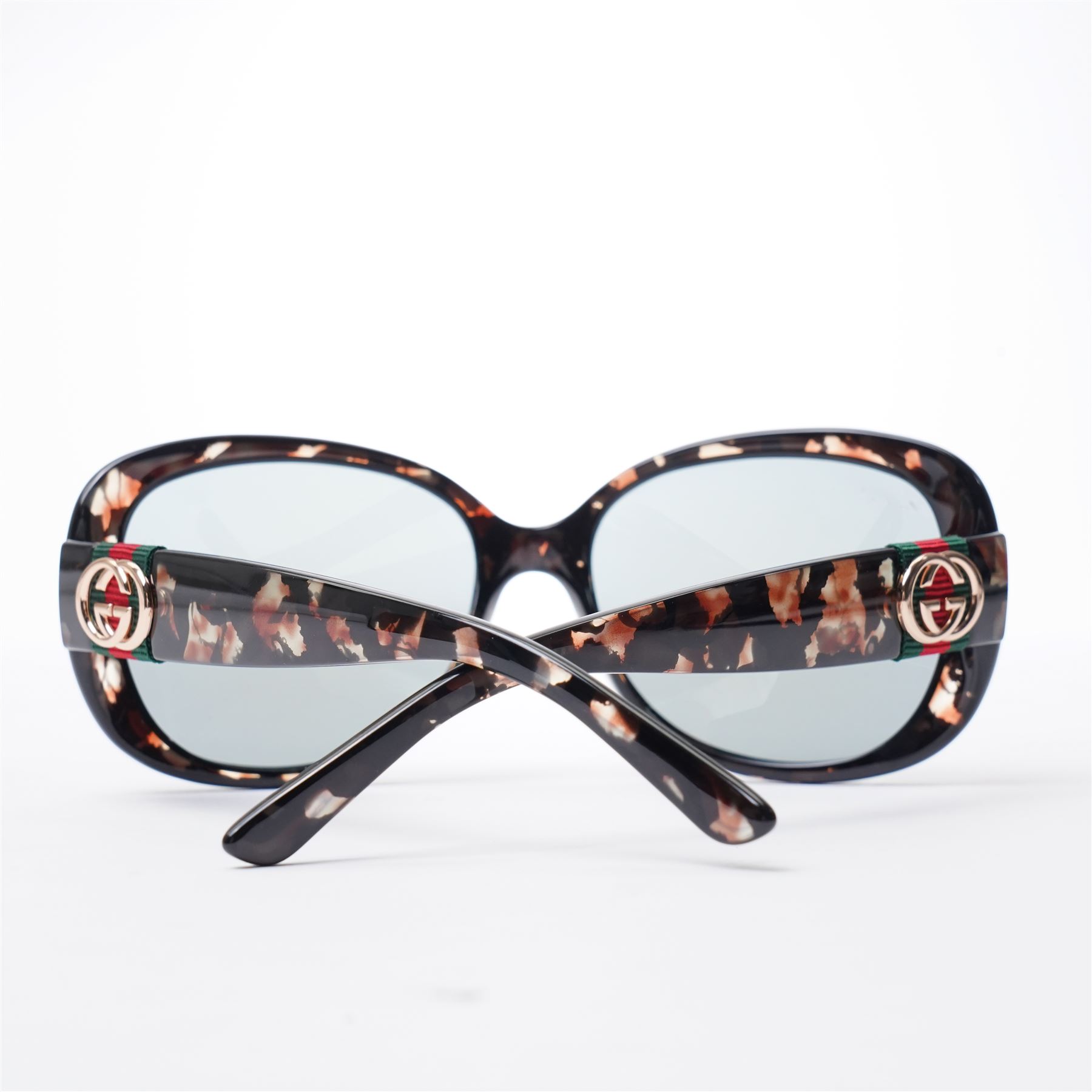 Gucci - pair of oversized sunglasses, with graduated mirrored lenses in tortoiseshell-effect frame, the arms with signature web stripe and interlocking gold-tone GG logo, unused with original monogram leather case 