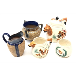   Royal Doulton stoneware cauldron shaped planter, chine decorated with swirls, H12cm, Doulton Lambeth stoneware jug and a Portland Pottery three piece tea set modelled with Fox Hunting decoration   