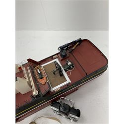 24-Volt radio controlled model of the American tug boat 'Jo-Jo' with full range of deck fittings, transmitter, remote control, receivers and two launching straps, displayed on wooden stand L103cm