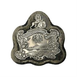 Silver presentation plaque, the Toogood Championship Shield, embossed with lion and flowers, mounted upon a velvet easel style support, hallmarked H17cm