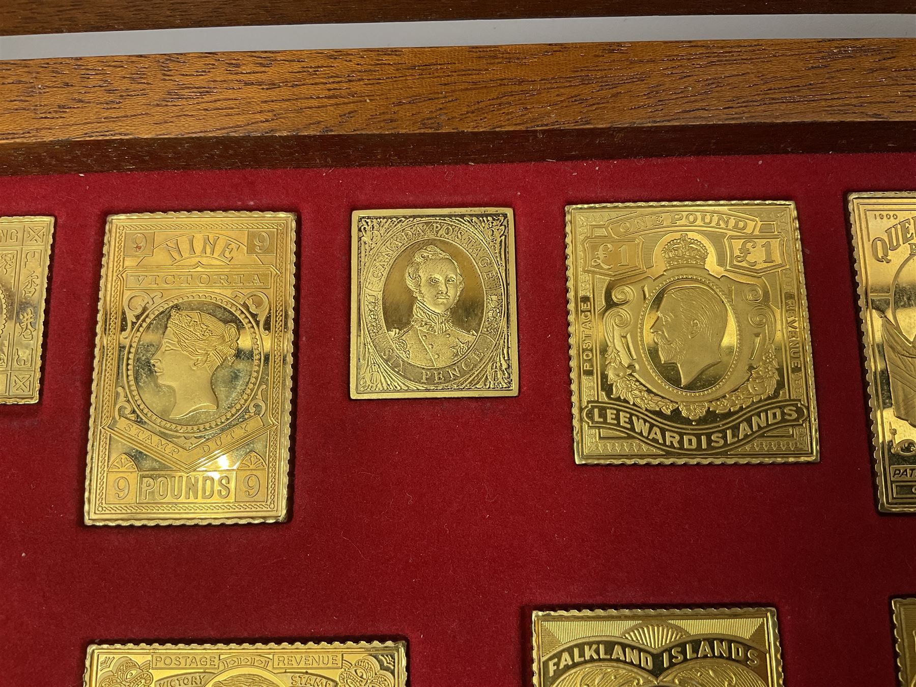 Danbury Mint sterling silver hallmarked stamp ingot set of twenty-five, housed in a fitted wooden case