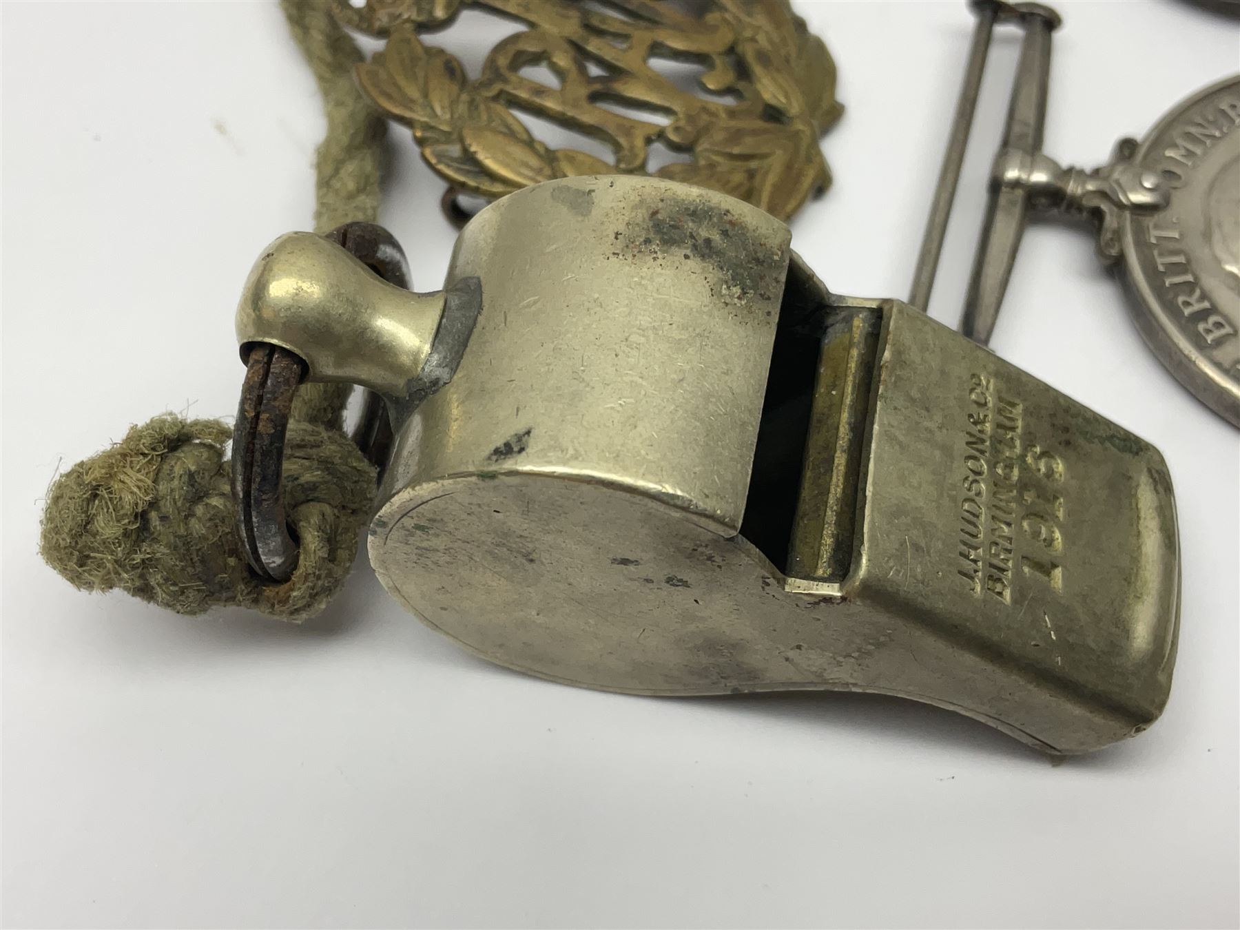 WWI J. Hudson & Co. Birmingham trench whistle dated 1916; WWI British War Medal awarded to 117363 Gnr. N.L. Wright R.A.; Services Rendered badge No.111643; RAF & RFC cap badges etc