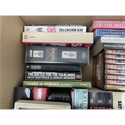 Large collection of hardback and paperback books, mainly military books, to include Band of Brothers, Dawn of D-Day, Dessert Warrior, Book of the Somme, Battle of Britain, etc in four boxes  