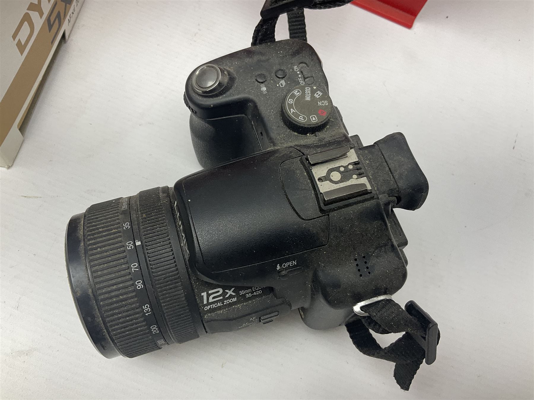 Minolta Dynax 5xi camera body serial no 17222646 with 'AF Zoom Xi 28-80mm 1:4(22)-56' lens serial no 17220881, Minolta SRT101 camera body serial 1944687, Lumix camera body serial no K6SC10168 etc 