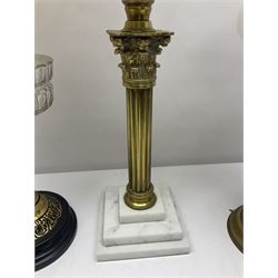 Brass Corinthian column oil lamp, upon stepped marble base, together three other brass table lamps, tallest H68cm