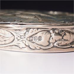 Edwardian silver oval dressing table box, the hinged cover embossed with angel heads W10cm London 1902 Maker William Comyns & Sons and an Edwardisn pierced silver oval sweetmeat basket L18cm Sheffield 1907 Maker James Dixon & Sons Ltd