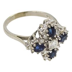 White gold oval sapphire and round brilliant cut diamond cluster ring, stamped 18ct