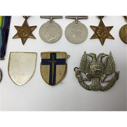 WW1 pair of medals awarded to 151761 Gnr. S. Loten R.A. with ribbons; four WW2 medals with ribbons; and small quantity of cap badges, medallions etc