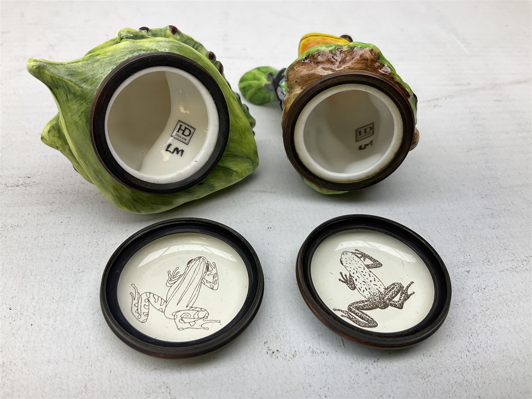 Four Halcyon Days bonbonnieres modelled as frogs, Golden Toad, Red-eyed frog, Dart-poison frog, and Poison Dart frog, in single box 