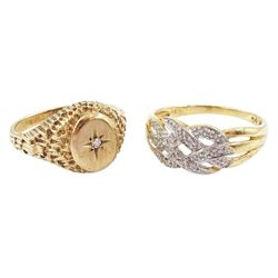 Gold diamond crossover ring and a gold single stone ring, both hallmarked 9ct