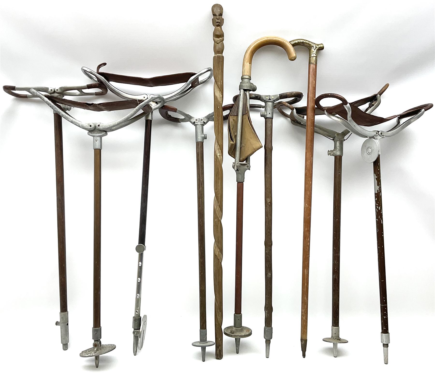 Adjustable Gamebird shooting stick, together with Mills Munitions shooting stick, Featherwate shooting stick, five others and two wooden walking sticks.  