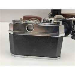 Canon EOS 50e camera body, serial no 8305671 with 'Canon Zoom EF 35-135mm 1:4-5.6' lens together with Halina 35X super camera body, with 'Halina Anastigmat f.c. 1:3.5 f=45mm' lens and other camera equipment 